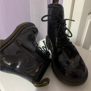 Dr. Martens Black Patent Combat Boots with Yellow Stitching Accents